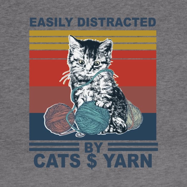 cat easily distracted by cats and yarn by Phylis Lynn Spencer